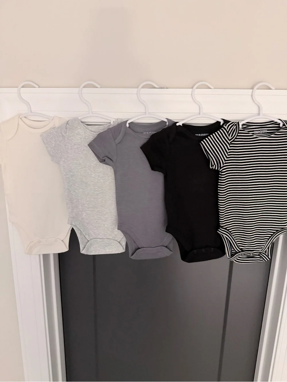 Old Navy 5-Pack Baby One-Piece Bodysuits in Cream, Light Gray, Charcoal, & Black